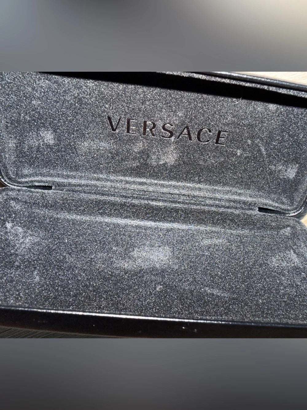 Versace Black Case with Gold Lettering